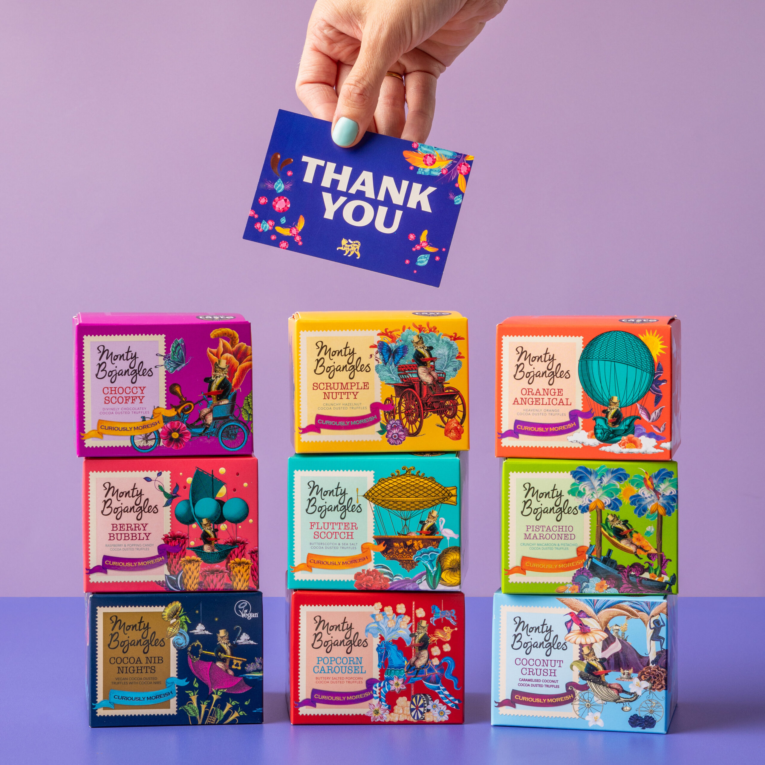 Monty Bojangles truffle gift boxes and chocolatey truffle bundles displayed in colourful packaging